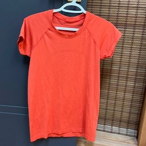 Lululemon T-shirt, size 8.